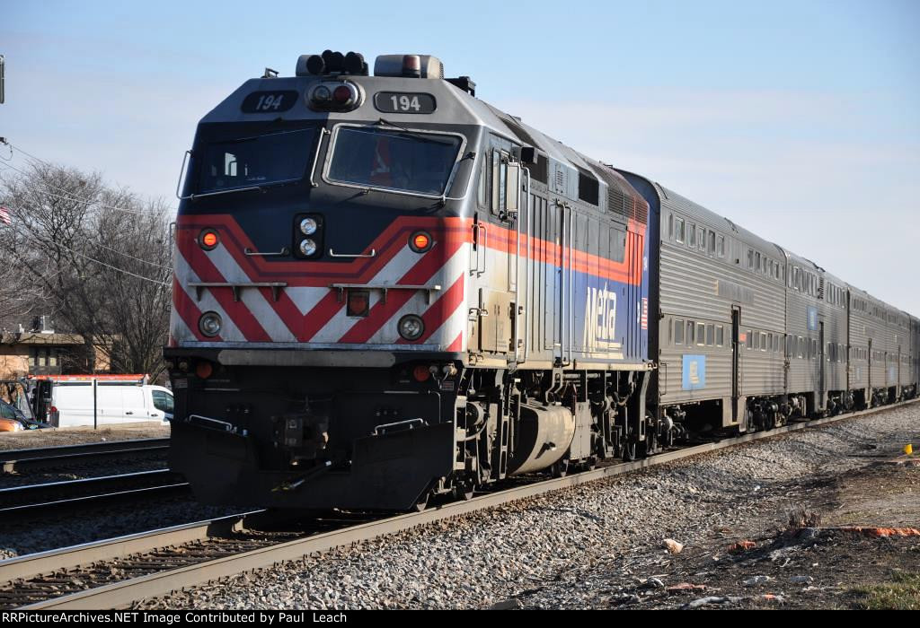 Inbound commuter shoves east out of the station